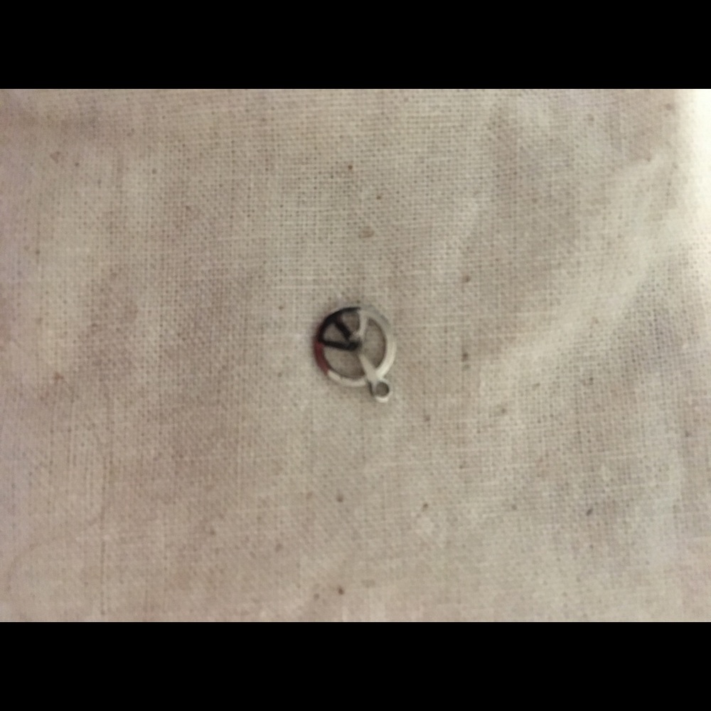 Tiny peace sign charm